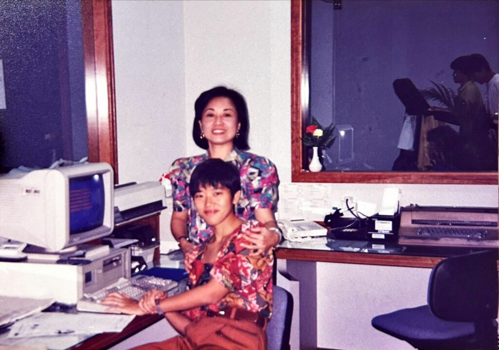 Betty (in purple) and her colleague at the old administrative office